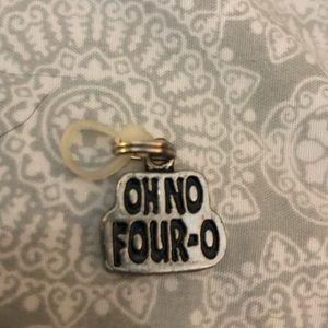 GANZ silver toned charm-four o